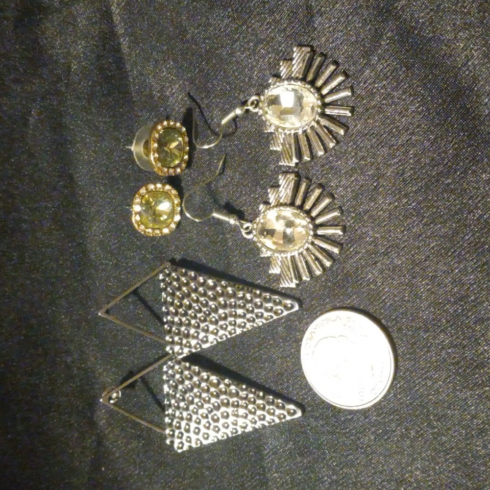 Three pairs of earrings.